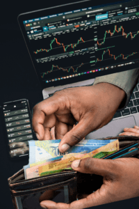 Money with stock market background.