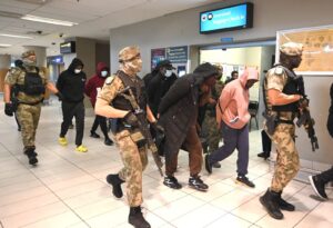Black Axe Extradition CaseSix Alleged Black Axe Syndicate Members Face US Prosecution Following Extradition From South Africa